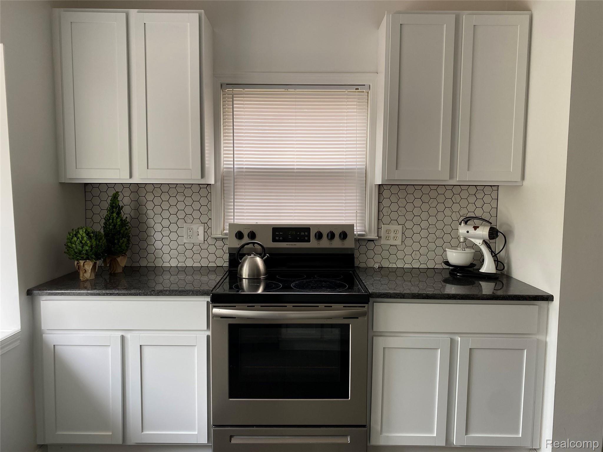 4168 Yorkshire Road Detroit, MI 48224 - Photo 18 of 48 New cabinetry and high efficiency stainless appliances