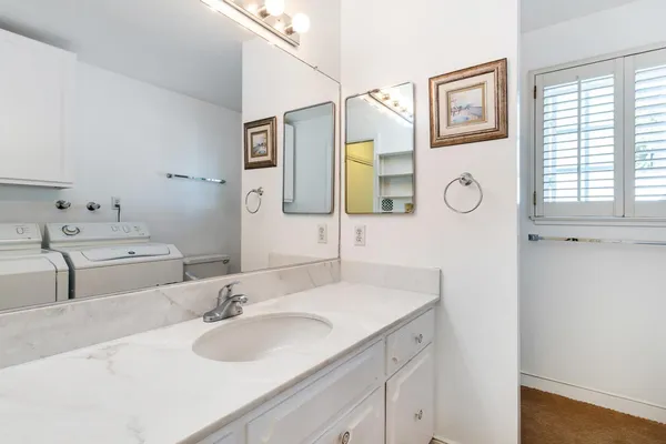 a bathroom with a sink and a toilet