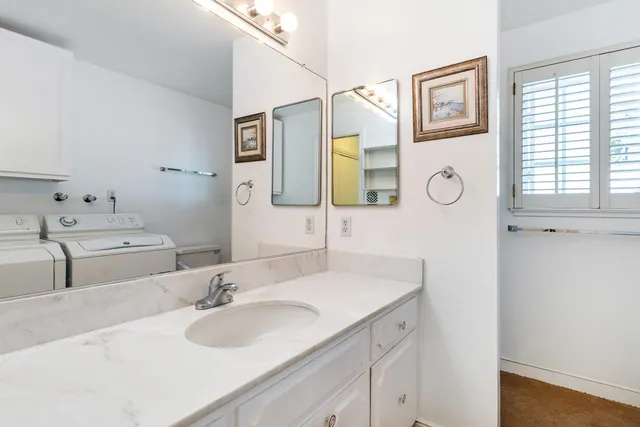 a bathroom with a sink and a toilet