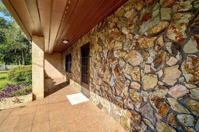 a view of a house with a tree