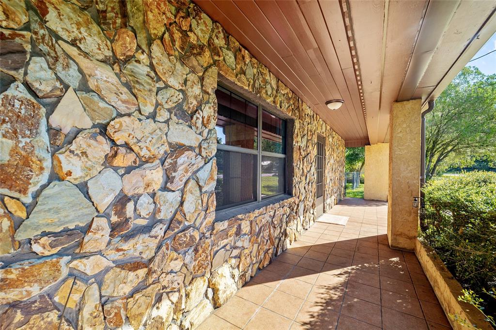 5201 East Jasmine Lane Inverness, FL 34453 - Photo 16 of 50 a view of a house with a tree