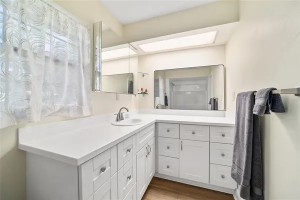 a bathroom with a sink toilet and bathtub