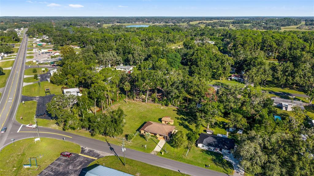 5201 East Jasmine Lane Inverness, FL 34453 - Photo 5 of 50 an aerial view of a house with a yard