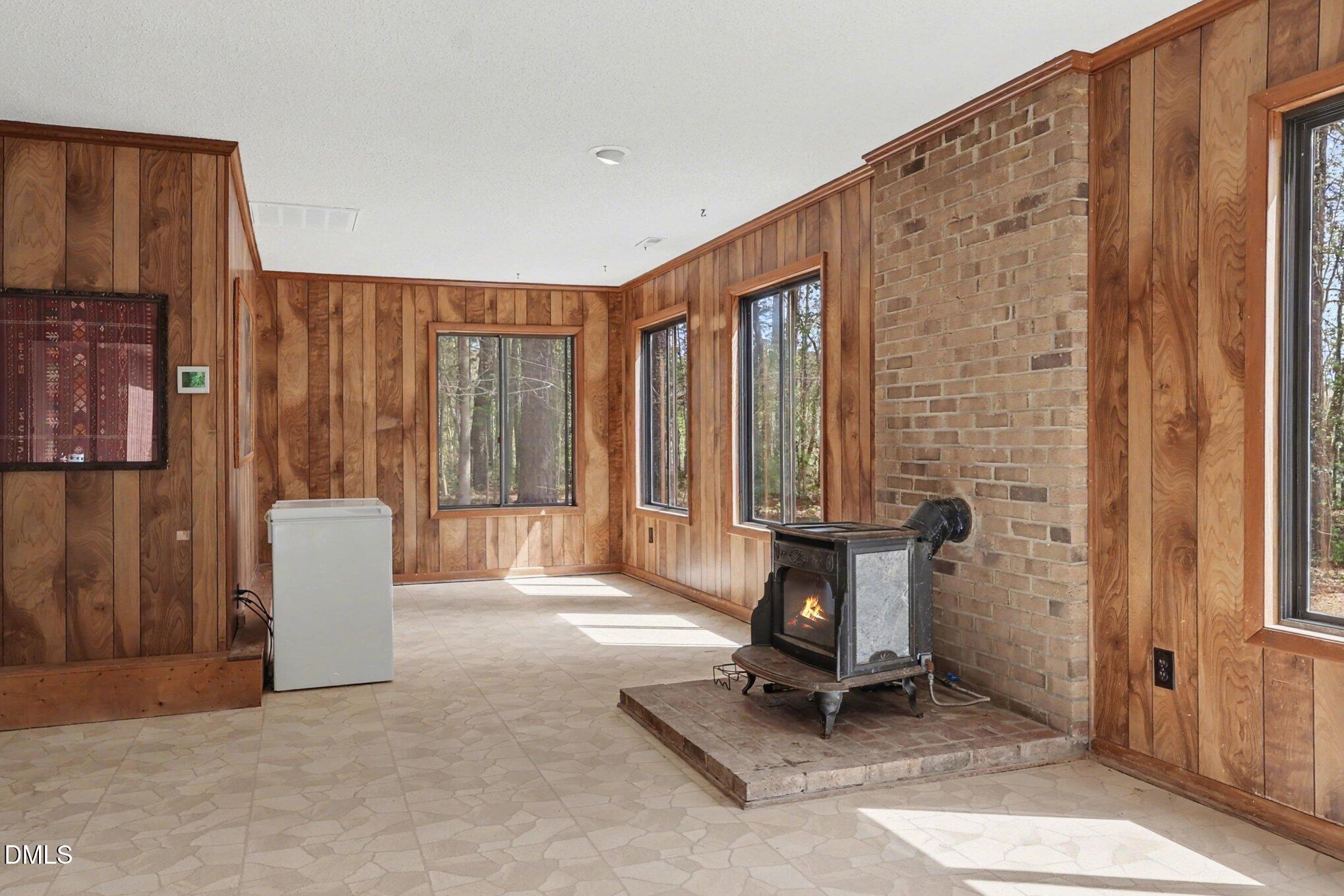 5702 Old Greensboro Road Chapel Hill, NC 27516 - Photo 13 of 43 a living room with a furniture and a window