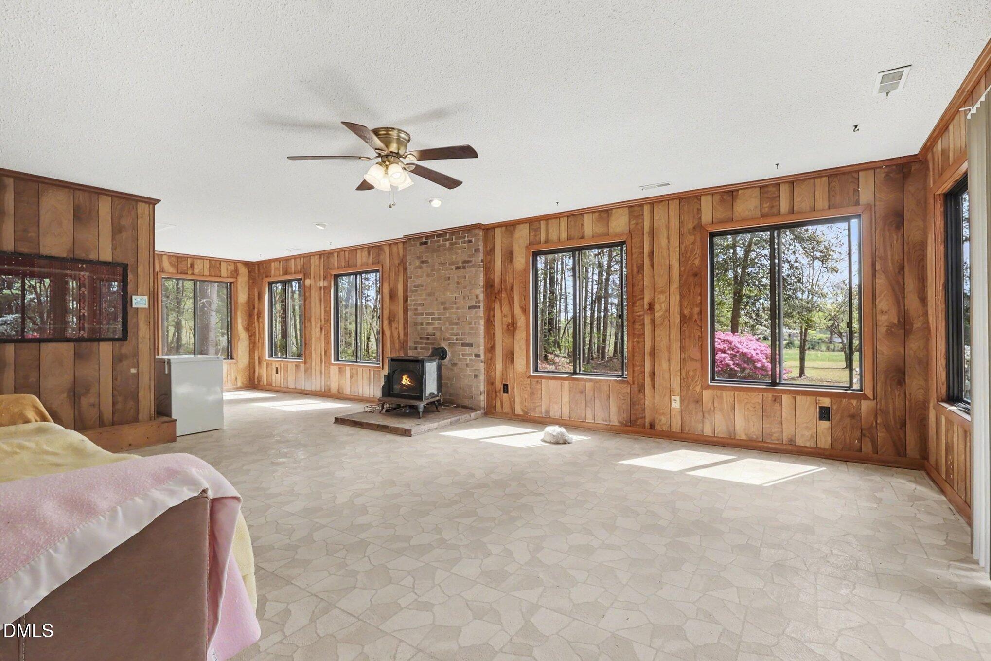 5702 Old Greensboro Road Chapel Hill, NC 27516 - Photo 14 of 43 a view of a livingroom with furniture and a large window