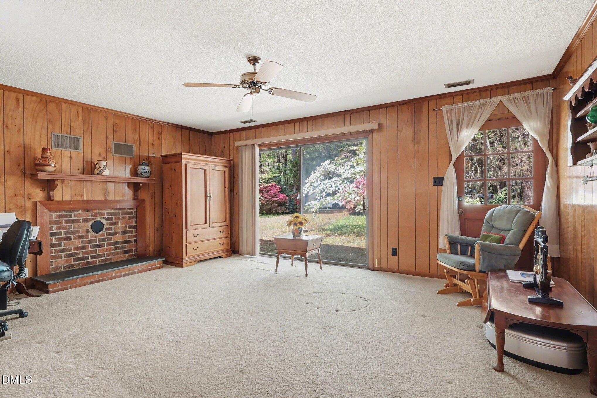 5702 Old Greensboro Road Chapel Hill, NC 27516 - Photo 24 of 43 a view of a livingroom with furniture and a window