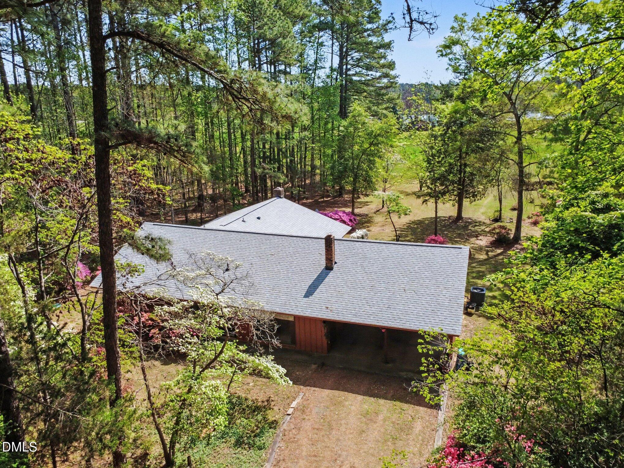 5702 Old Greensboro Road Chapel Hill, NC 27516 - Photo 33 of 43 view of a house with a yard and sitting area