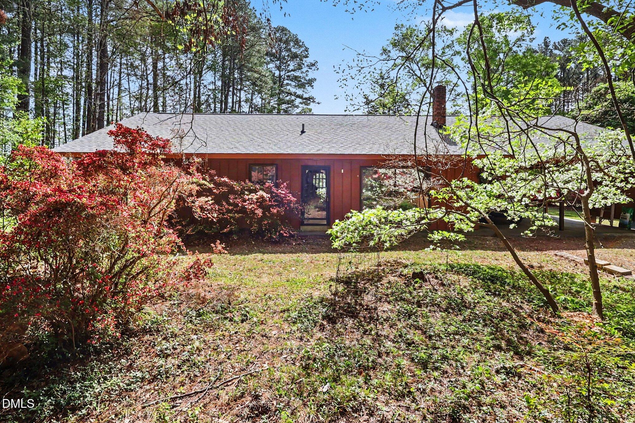 5702 Old Greensboro Road Chapel Hill, NC 27516 - Photo 7 of 43 a view of a backyard