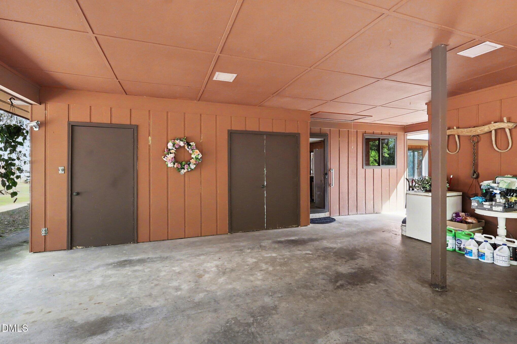 5702 Old Greensboro Road Chapel Hill, NC 27516 - Photo 10 of 43 a view of a hallway with seating area