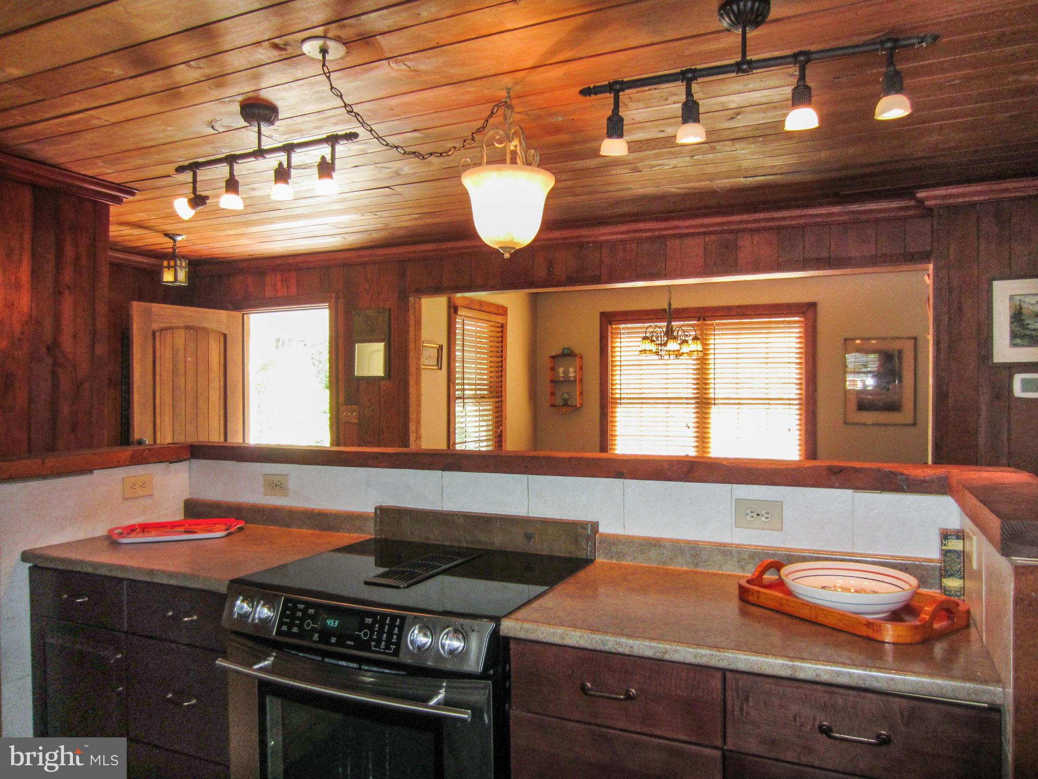 6042 Drum Point Road Deale, MD 20751 - Photo 8 of 21 a kitchen with a sink and a stove