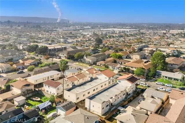 an aerial view of a city with lots of residential buildings