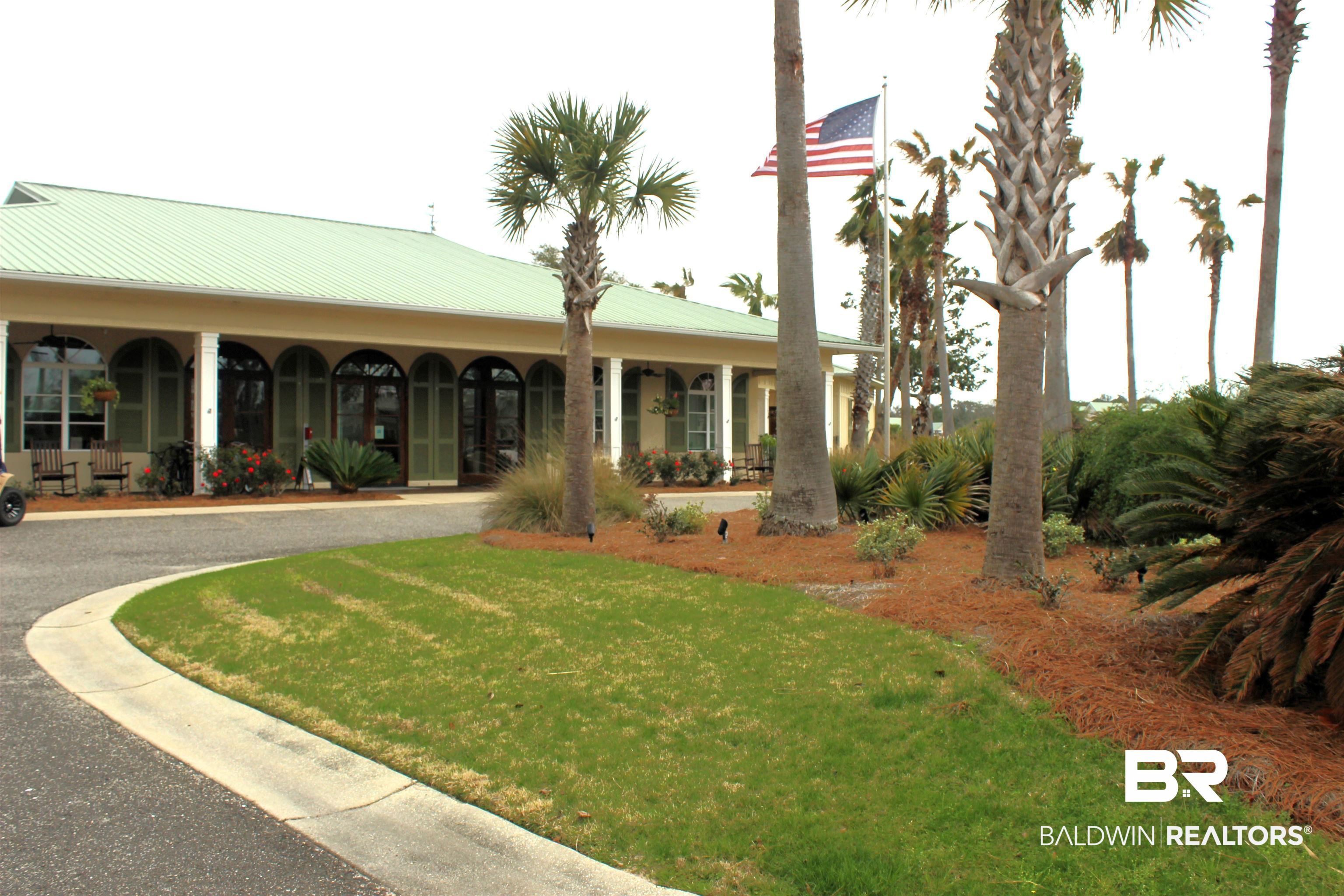 28114 Preserve Trail, Unit 190 Elberta, AL 36530 - Photo 37 of 69 View of front of house with a front yard and a metal roof