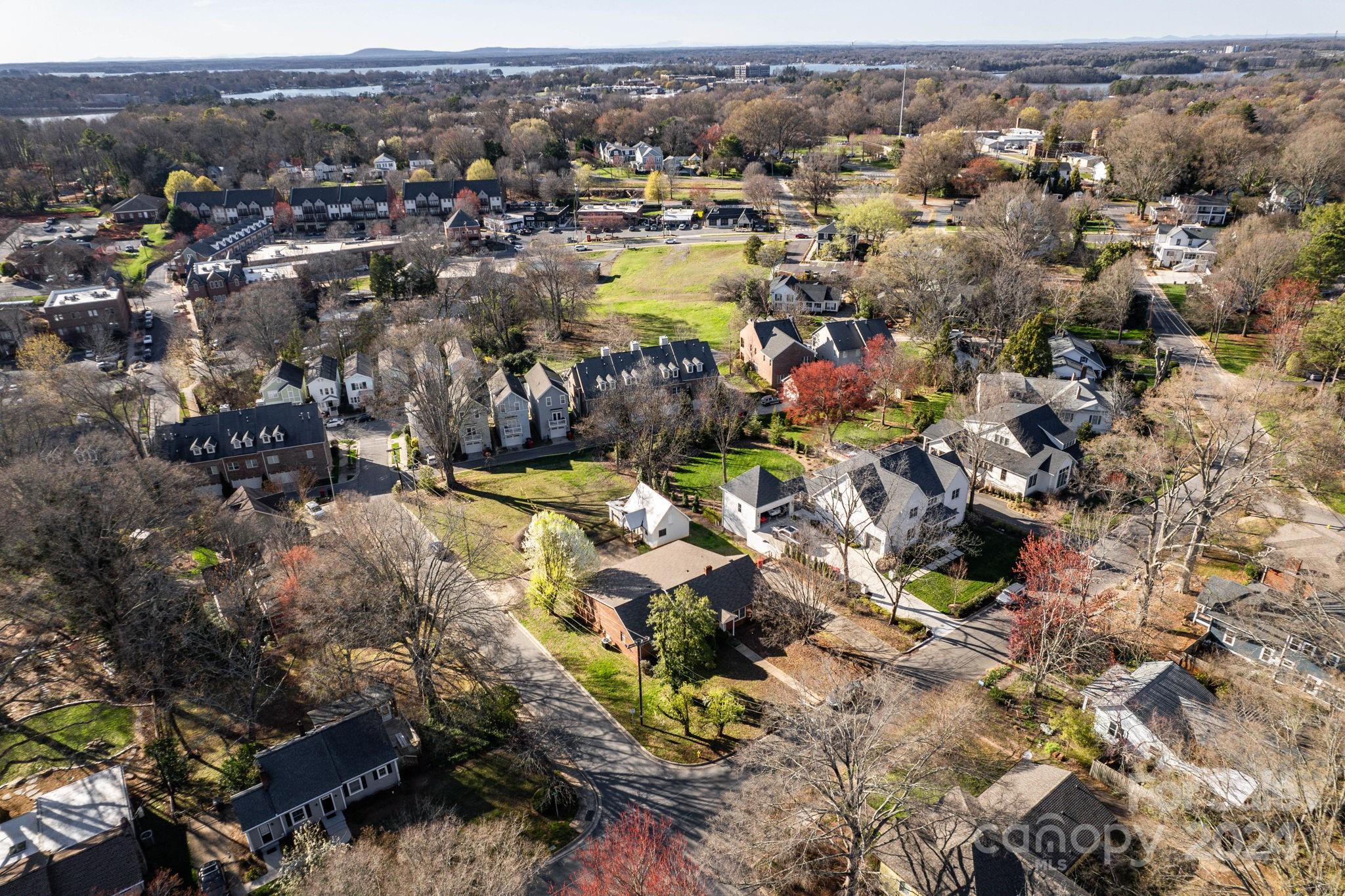 318 Walnut Street Davidson, NC 28036 - Photo 11 of 21 an aerial view of residential houses with outdoor space