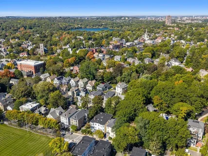 an aerial view of a city with lots of residential buildings