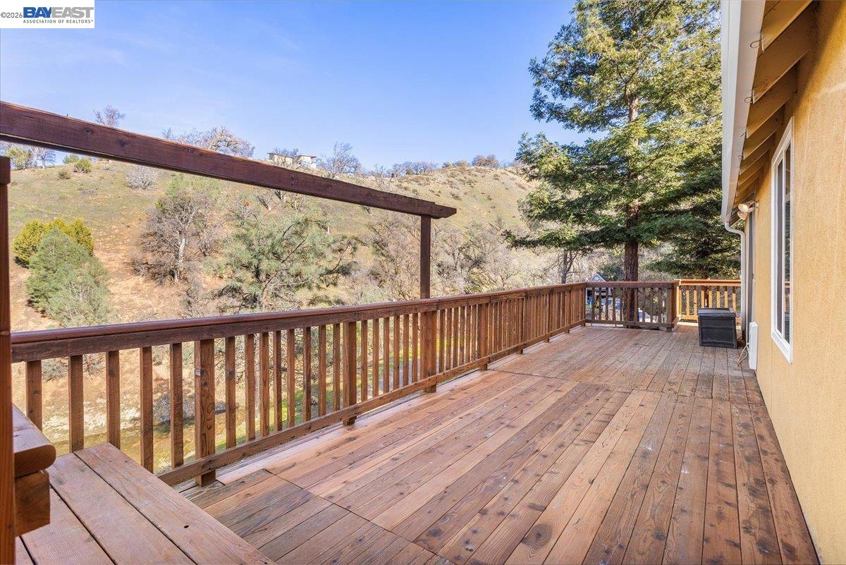 17370 West Corral Hollow Road Tracy, CA 95377 - Photo 25 of 43 a view of balcony with wooden floor and fence