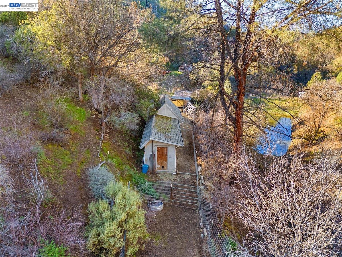 17370 West Corral Hollow Road Tracy, CA 95377 - Photo 34 of 43 a house that has a tree in it