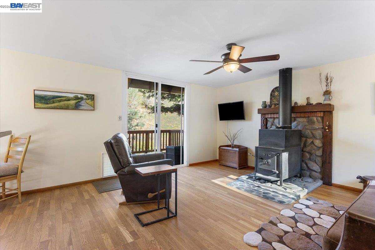 17370 West Corral Hollow Road Tracy, CA 95377 - Photo 4 of 43 a workspace with wooden floor
