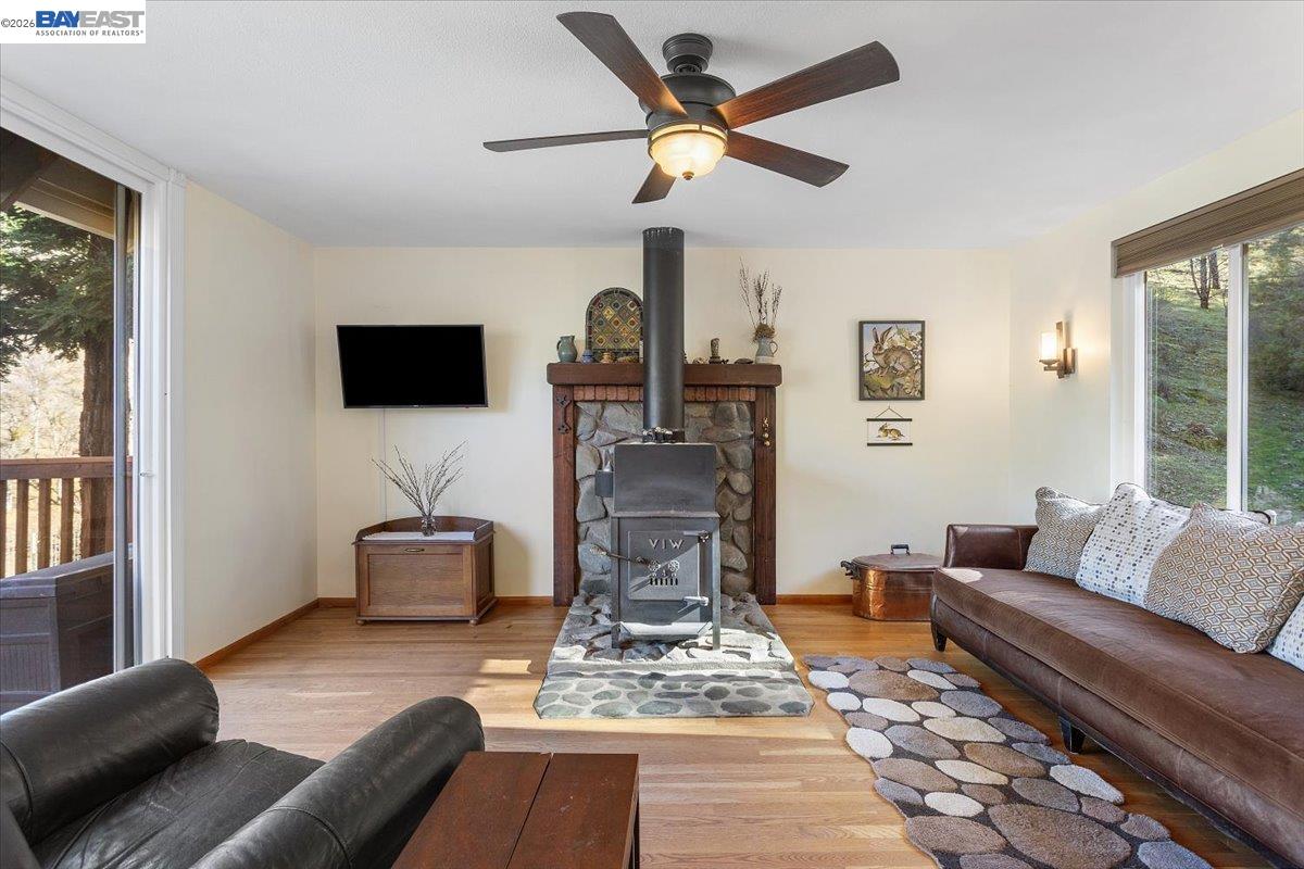 17370 West Corral Hollow Road Tracy, CA 95377 - Photo 5 of 43 a living room with furniture and a flat screen tv