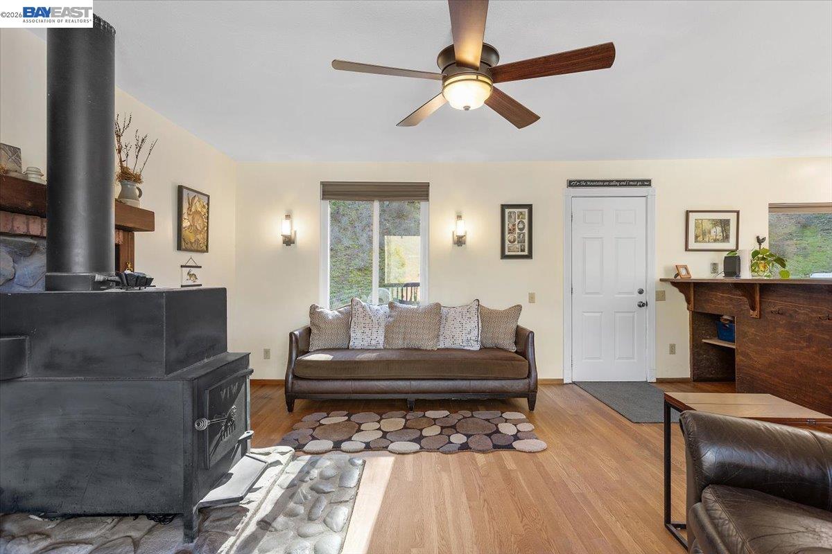 17370 West Corral Hollow Road Tracy, CA 95377 - Photo 6 of 43 a living room with furniture and a wooden floor
