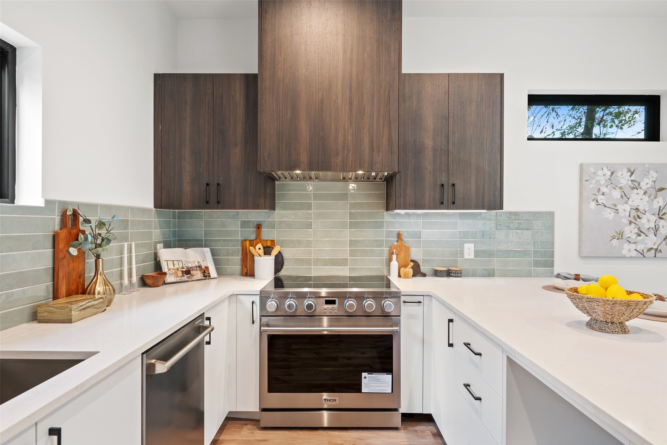 4407 Merle Drive, Unit B Austin, TX 78745 - Photo 2 of 38 a kitchen with a stove and a sink