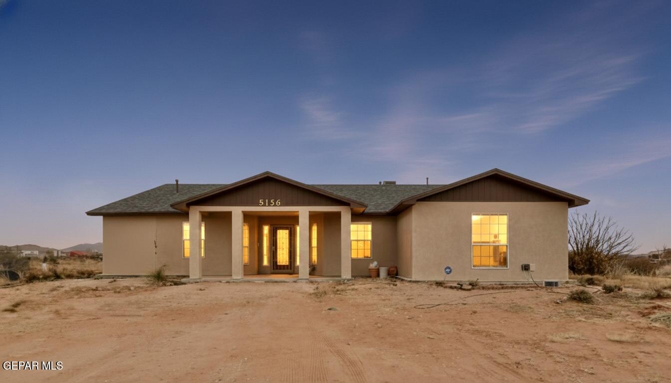 5156 Bradley Road El Paso, TX 79938 - Photo 3 of 39 a front view of a house with a yard