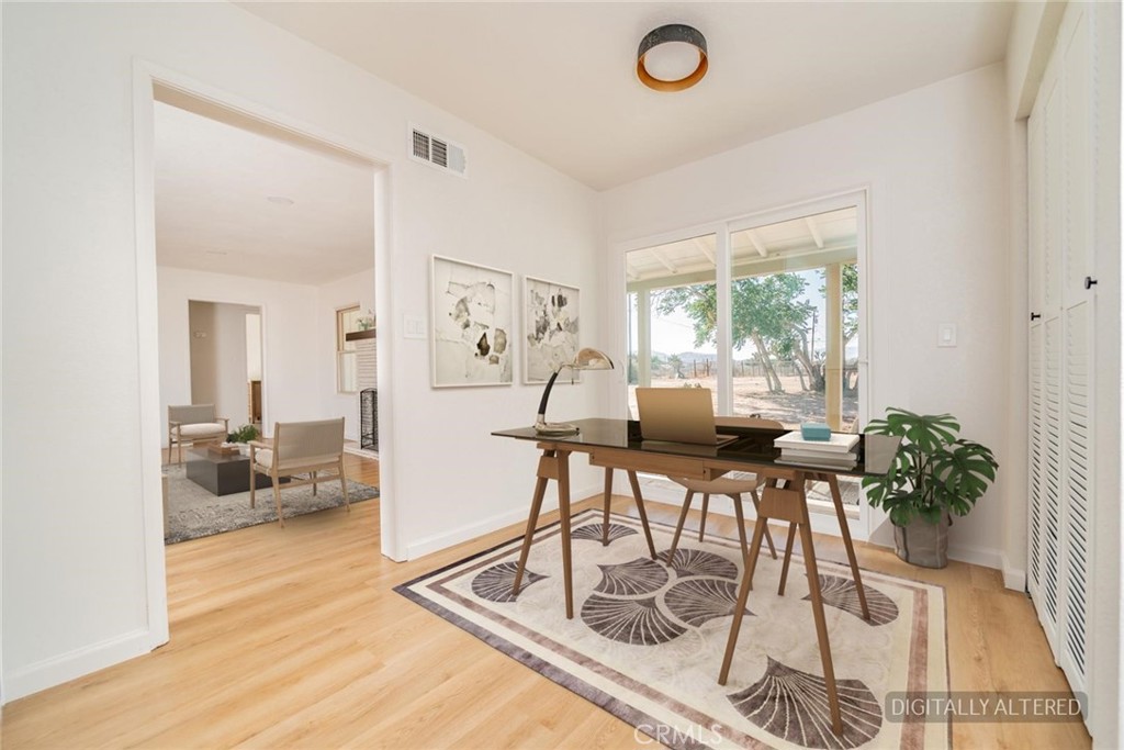 14387 Jicarilla Road Apple Valley, CA 92307 - Photo 6 of 24 Dining Area (Disclaimer: Some images have been digitally enhanced with virtual staging to illustrate potential room layouts and furnishings. Actual property condition and features may vary. Buyer to verify all information independently).