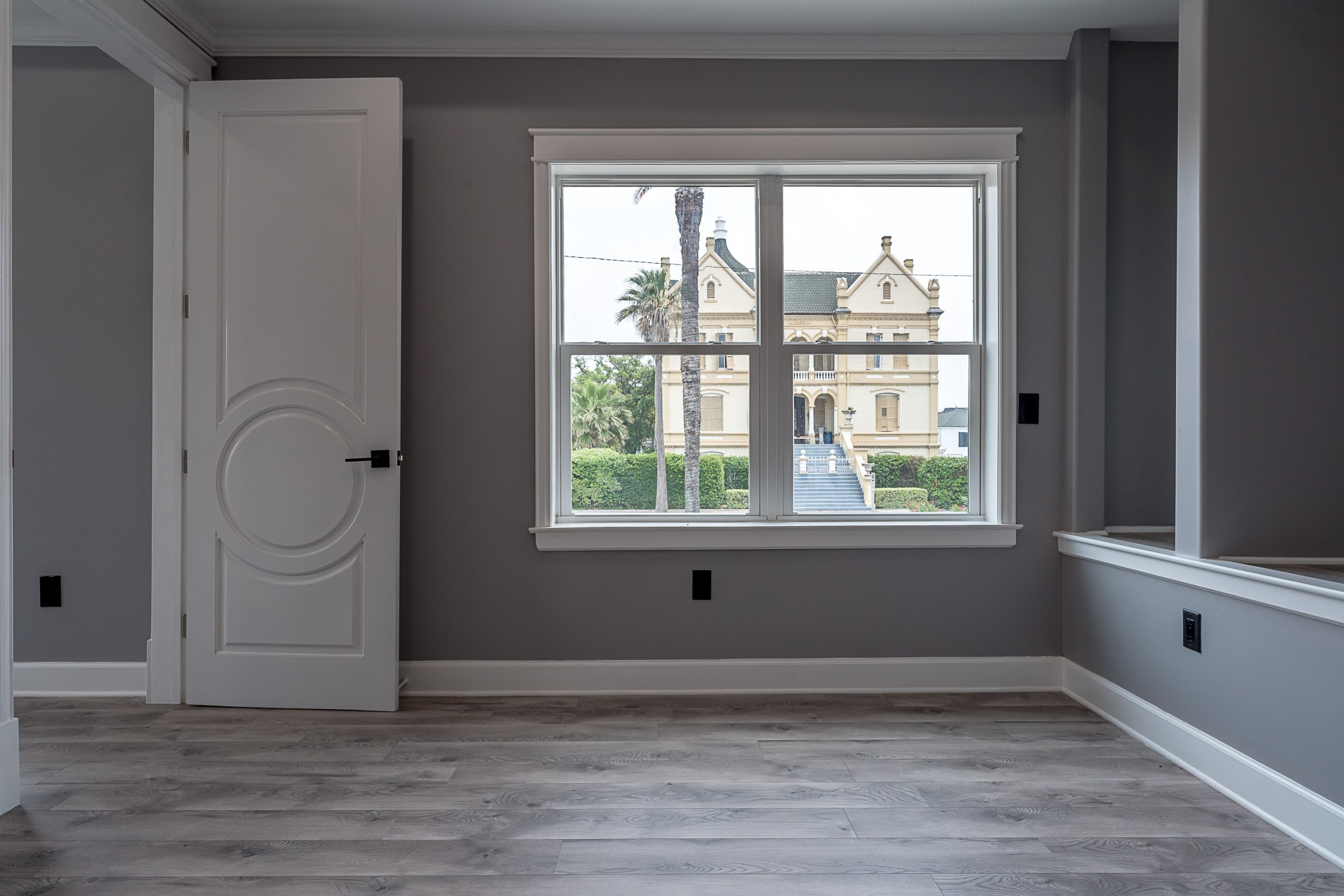 1801 Rosenberg Street, Unit 204 Galveston, TX 77550 - Photo 16 of 27 a view of an empty room with a window