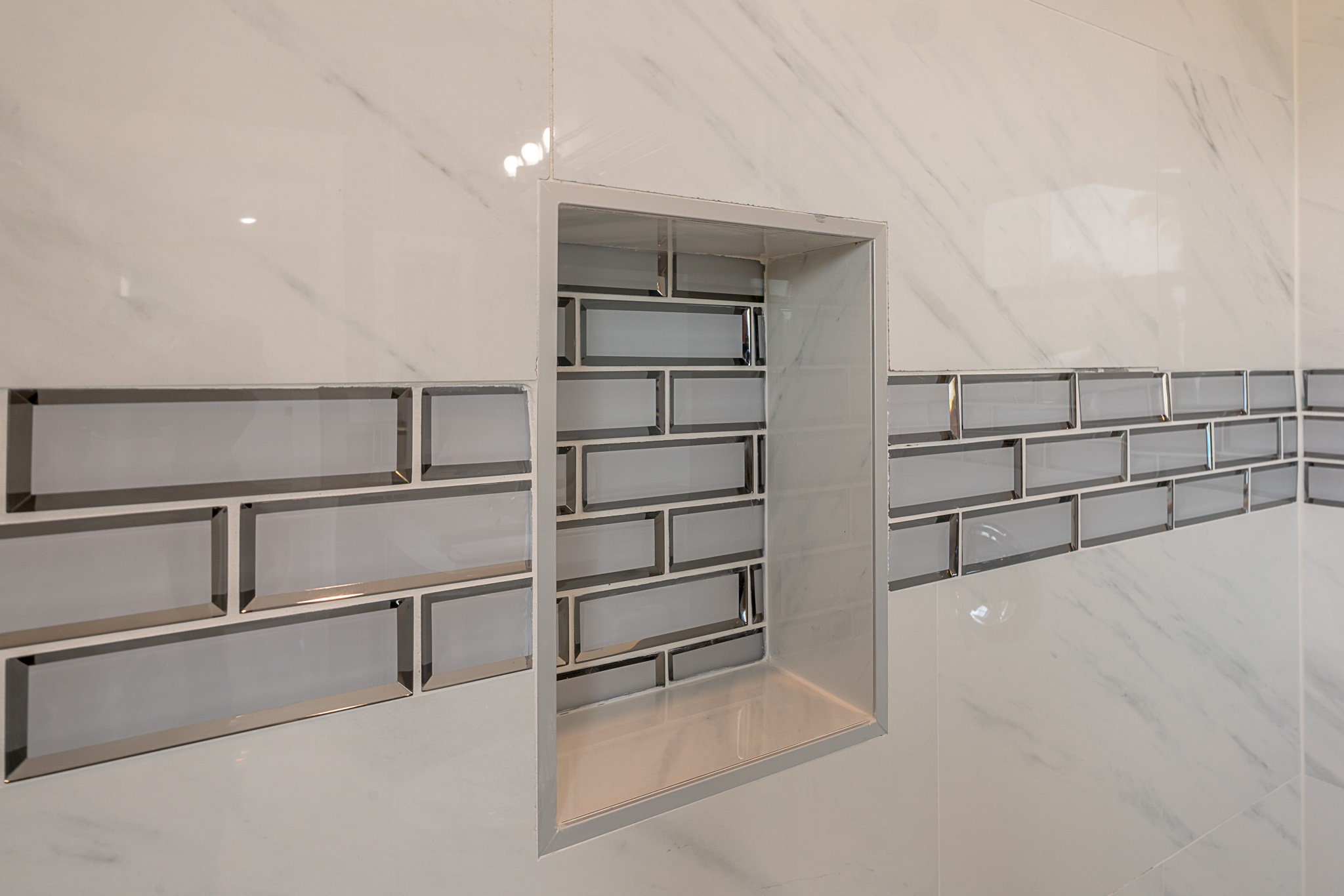 1801 Rosenberg Street, Unit 204 Galveston, TX 77550 - Photo 25 of 27 a view of a room with racks on the wall