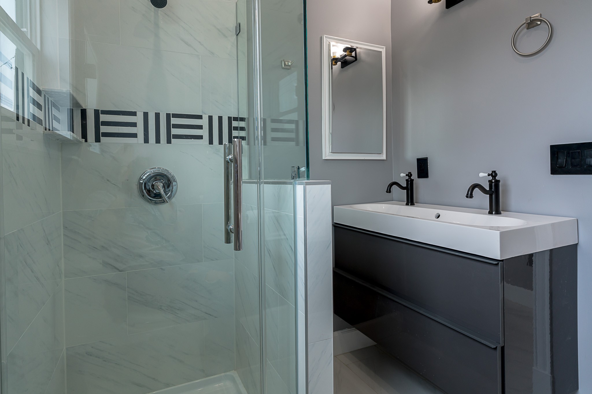 1801 Rosenberg Street, Unit 204 Galveston, TX 77550 - Photo 10 of 27 a bathroom with a sink and mirror