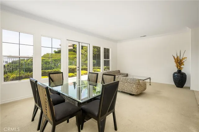 a bedroom with a bed and cabinets