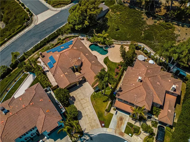 an aerial view of a house having yard