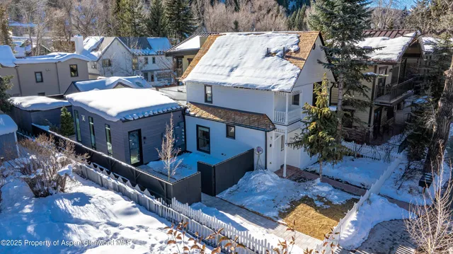 a view of a house with roof deck