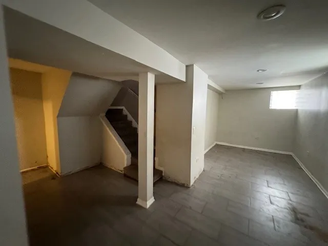 a bathroom with a sink mirror toilet and shower