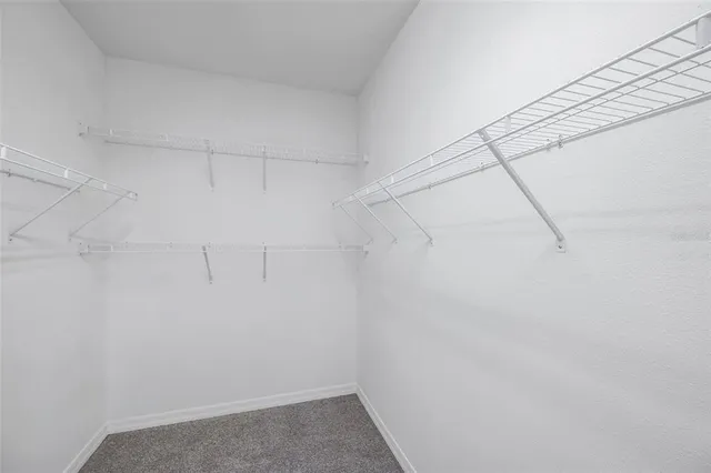 a view of a room with racks on the wall