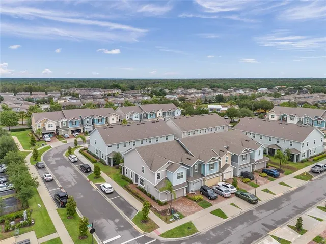 an aerial view of residential building with outdoor space
