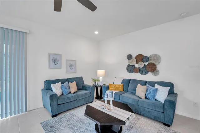 a living room with furniture and a couch