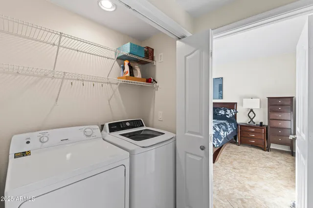 a view of a swimming pool with a patio and a garden