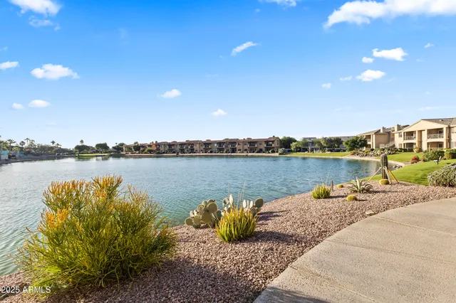 a view of a swimming pool with a patio