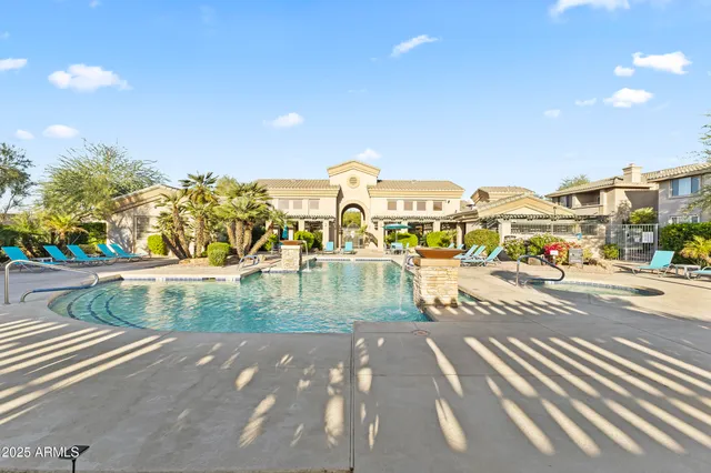 a kitchen with stainless steel appliances granite countertop a stove sink and cabinets