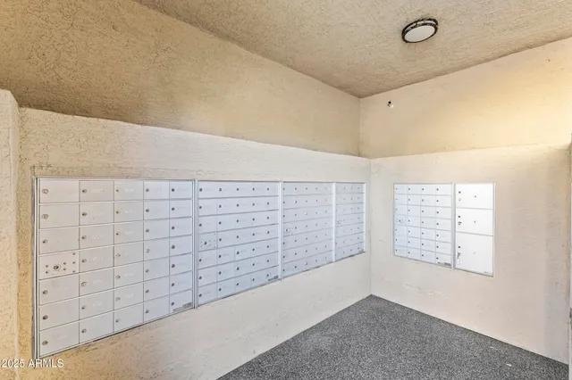 an aerial view of residential building with parking space