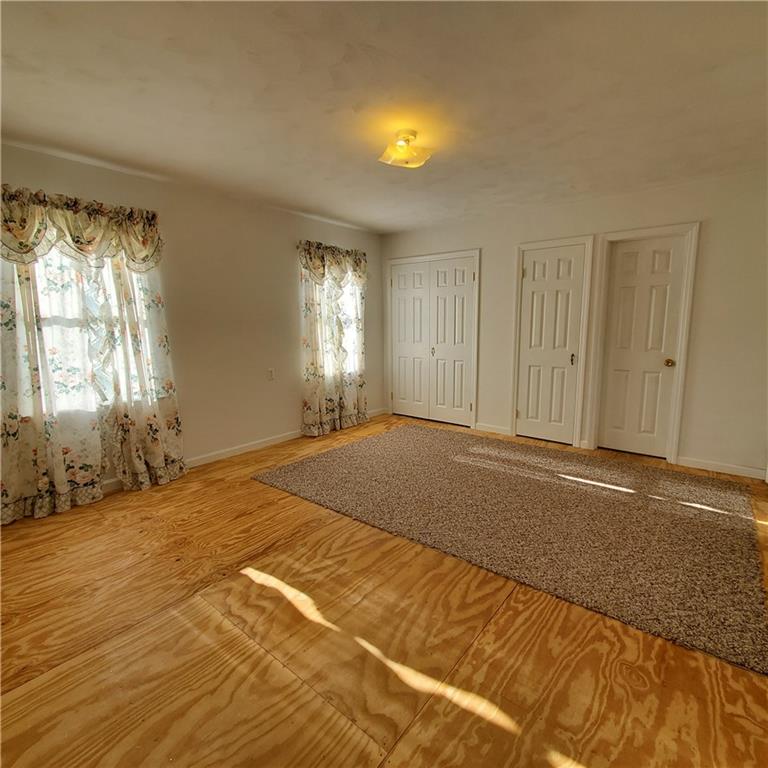 266 Catalpa Road Chicora, PA 16025 - Photo 13 of 23 a bedroom with a bed and a window