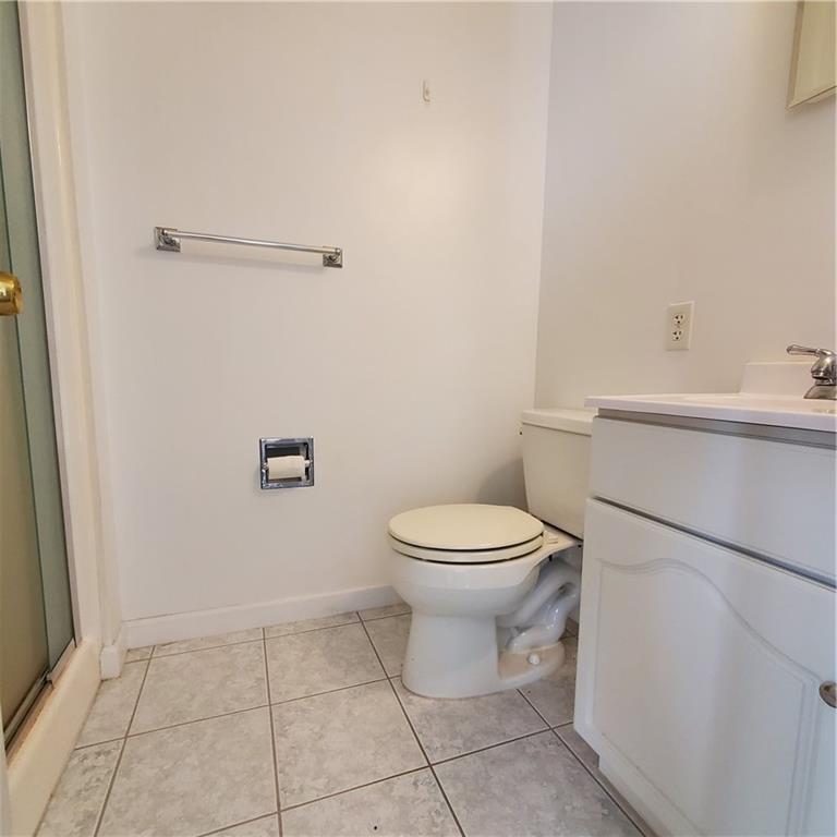 266 Catalpa Road Chicora, PA 16025 - Photo 16 of 23 a white toilet sitting next to a bathroom sink