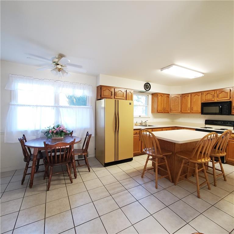 266 Catalpa Road Chicora, PA 16025 - Photo 4 of 23 a dining room with furniture and window