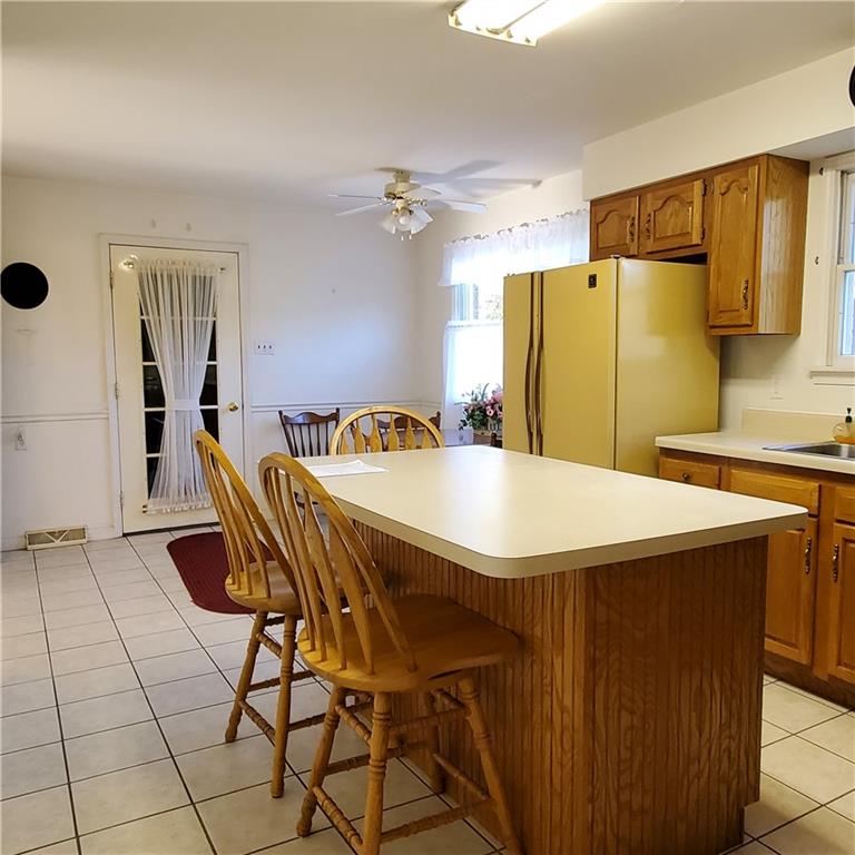 266 Catalpa Road Chicora, PA 16025 - Photo 6 of 23 a dining table chair next to a window