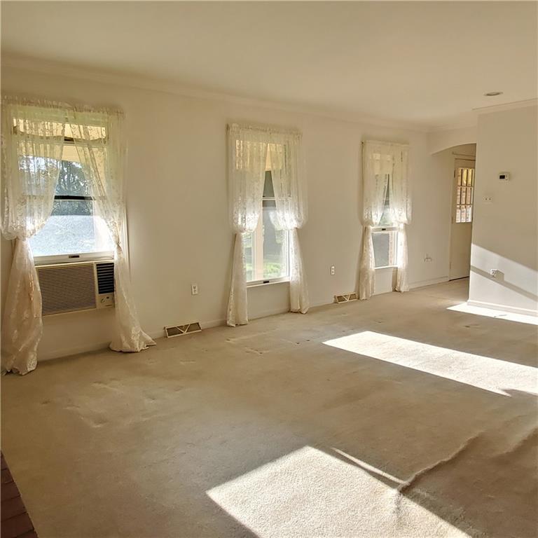 266 Catalpa Road Chicora, PA 16025 - Photo 10 of 23 a view of an empty room with a fireplace