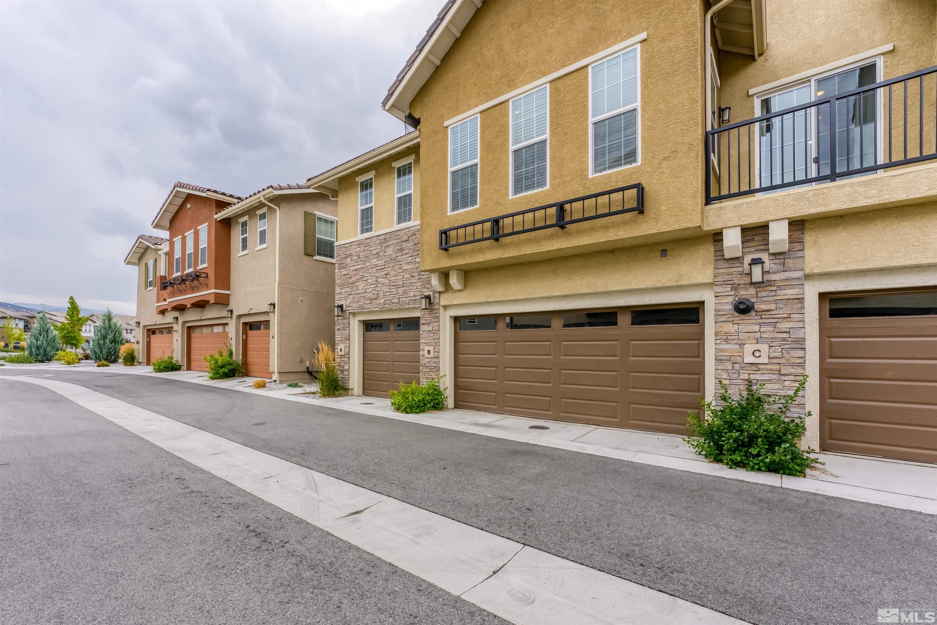 1945 Sea Horse Road, Unit A Reno, NV 89521 - Photo 1 of 25 a front view of a multi story residential apartment building