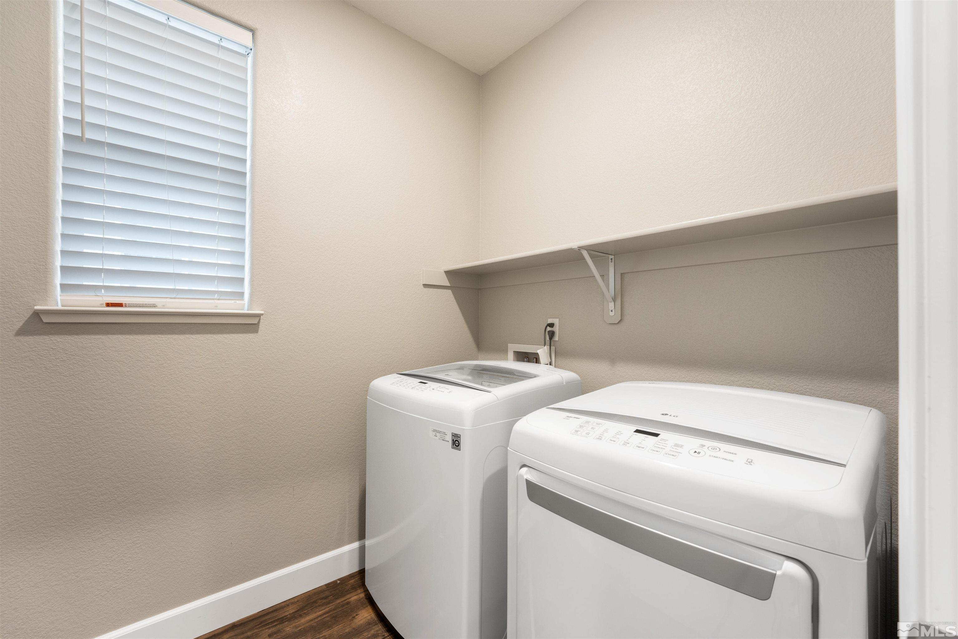 1945 Sea Horse Road, Unit A Reno, NV 89521 - Photo 21 of 25 a utility room with dryer and washer