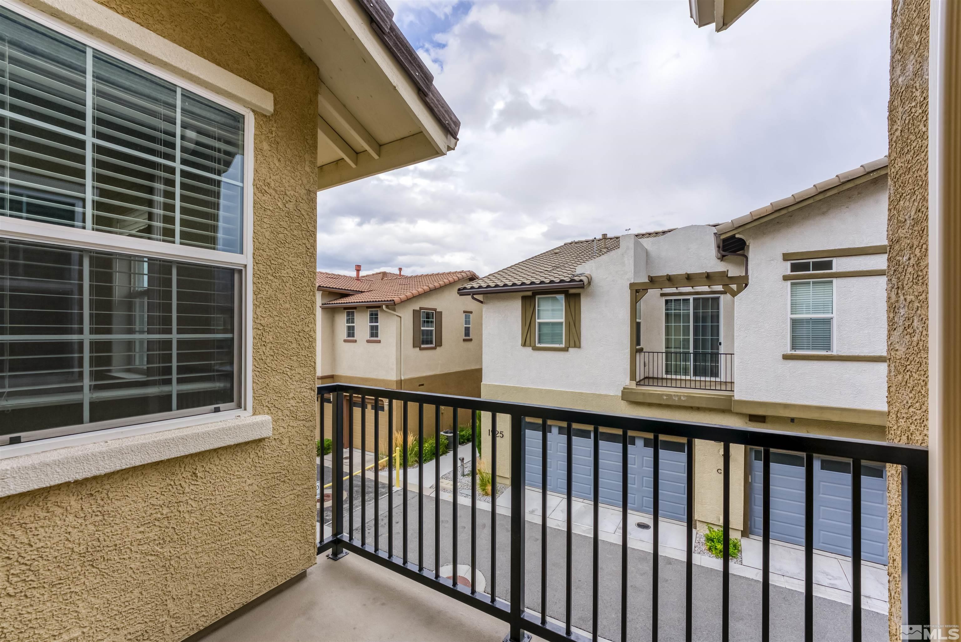 1945 Sea Horse Road, Unit A Reno, NV 89521 - Photo 22 of 25 a balcony view with a garden