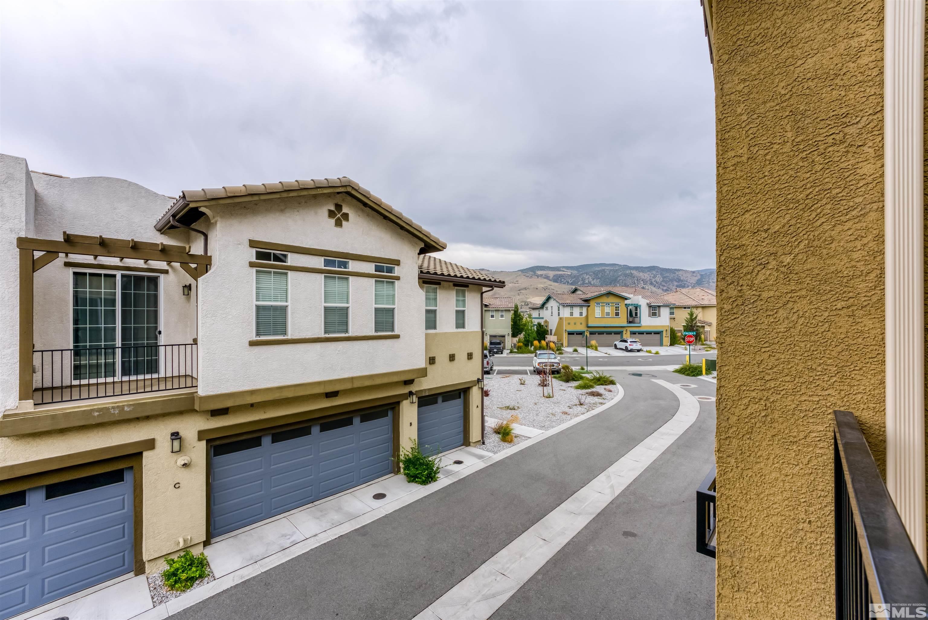 1945 Sea Horse Road, Unit A Reno, NV 89521 - Photo 23 of 25 a front view of a house with outdoor seating