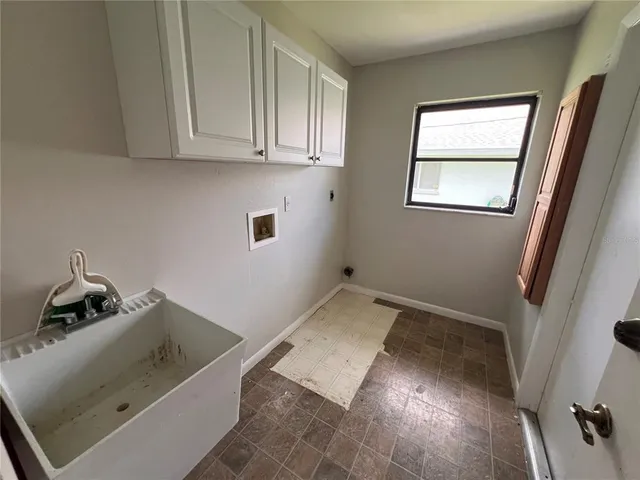 a view of a storage and utility room in a room